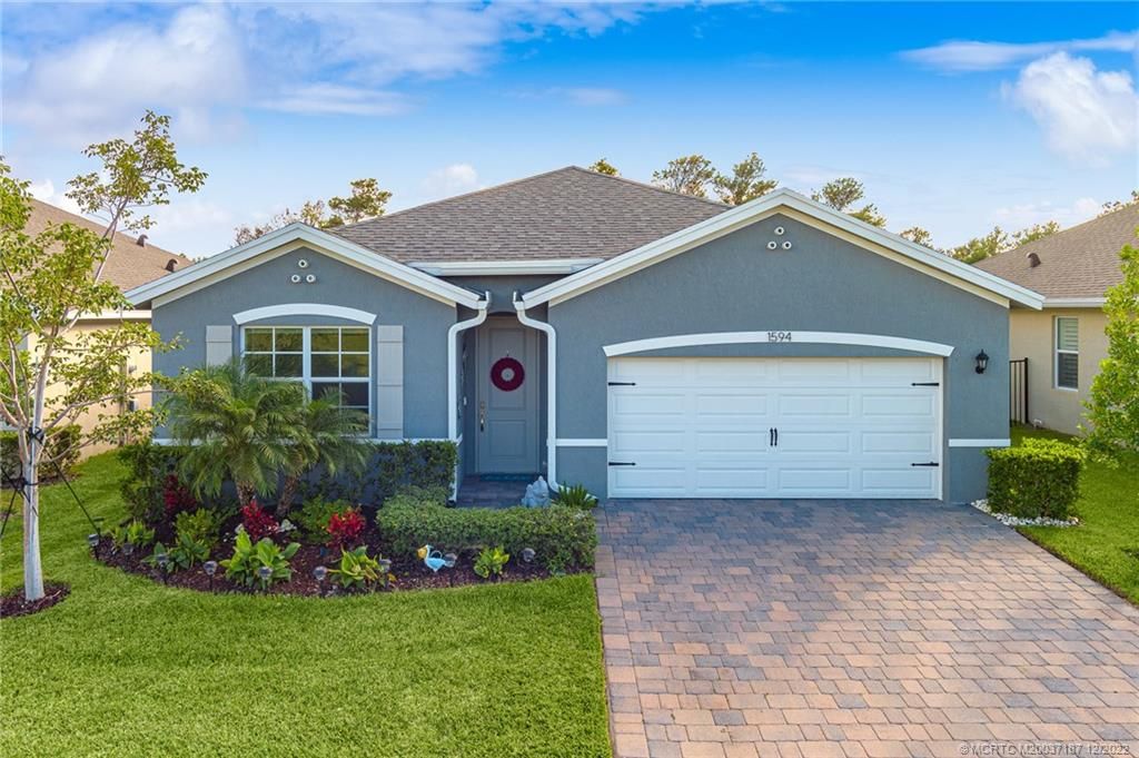 Photo of 1594 NE White Pine Terrace, Jensen Beach, FL 34957 (MLS # M20037187)