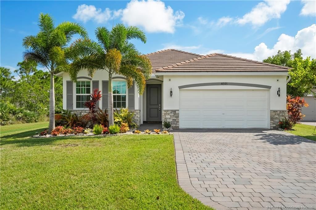 Photo of 4591 NW Exchange Avenue, Jensen Beach, FL 34957 (MLS # M20052560)