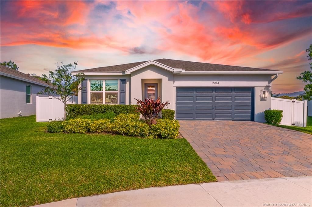 Photo of 2033 NE Ocean Dunes Drive, Jensen Beach, FL 34957 (MLS # M20054127)