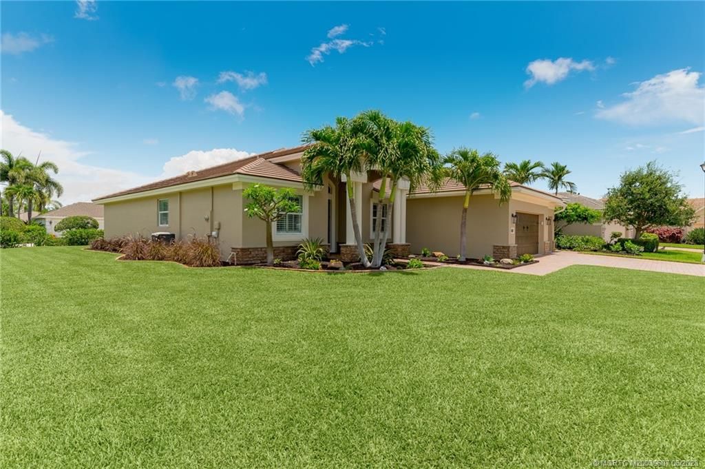 Photo of 491 NW Windflower Terrace, Jensen Beach, FL 34957 (MLS # M20039607)