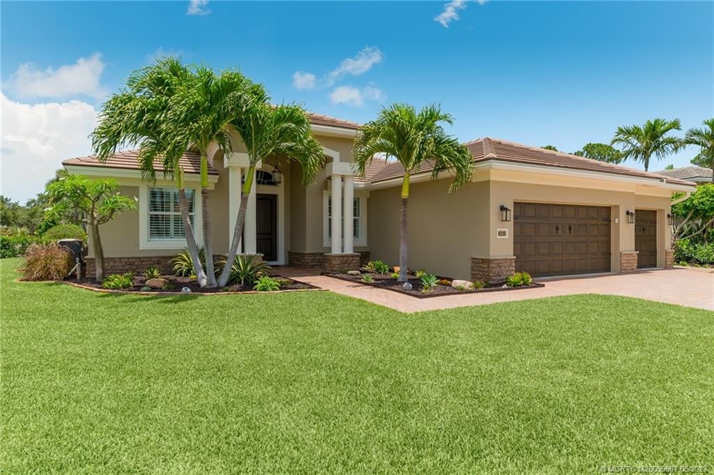 Photo of 491 NW Windflower Terrace, Jensen Beach, FL 34957 (MLS # M20039607)