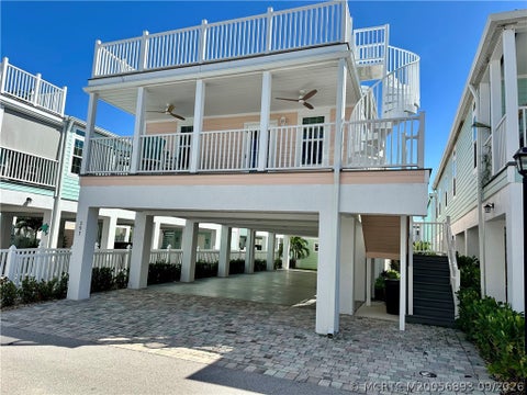 Photo of 397 NE Cabana Way, Jensen Beach, FL 34957 (MLS # M20056893)