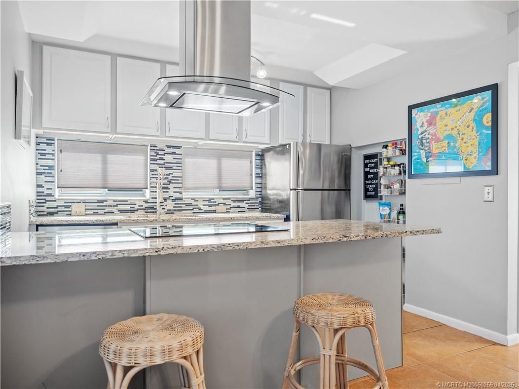 Photo of 950 S Kanner Highway #TH138, Stuart, FL 34994 (MLS # M20050259)