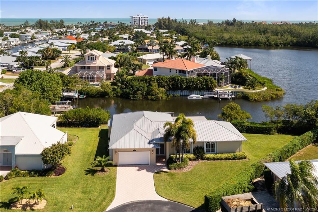 Photo of 103 Aqua Ra Drive, Jensen Beach, FL 34957 (MLS # M20041652)
