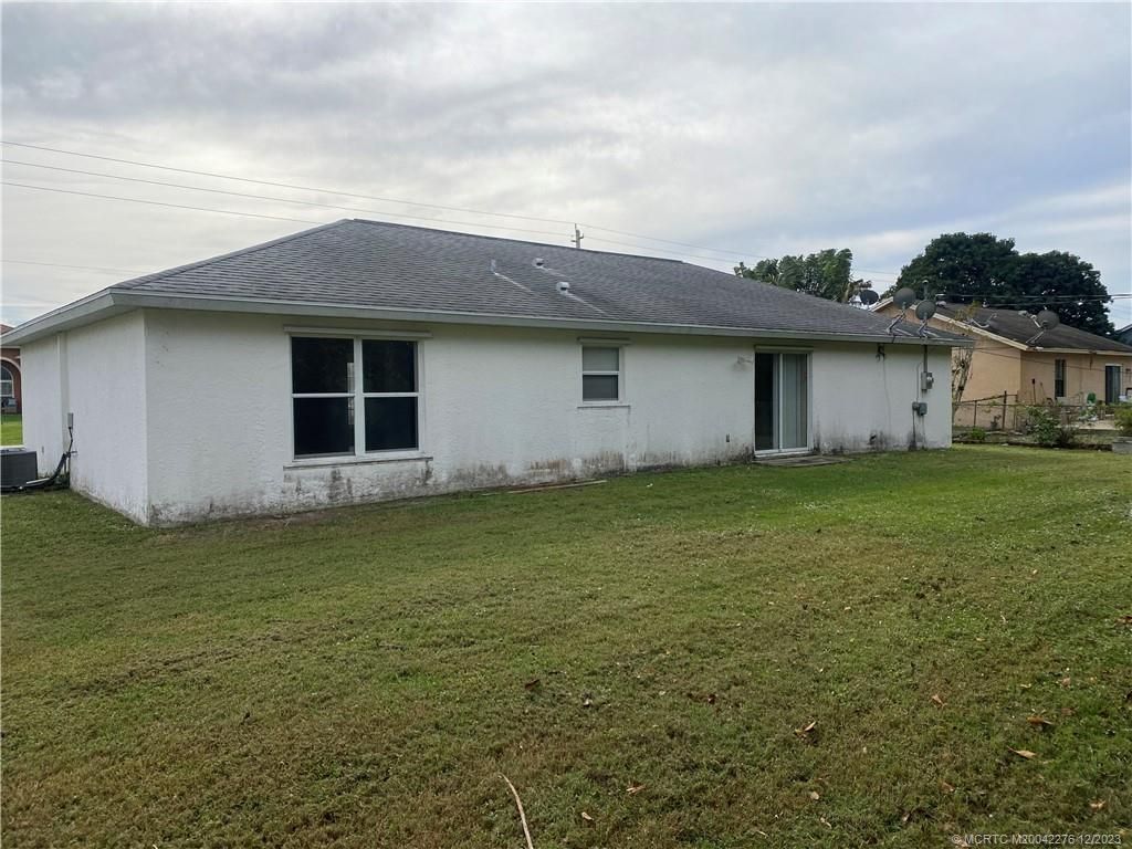 Photo of 549 SW Carter Street, Port Saint Lucie, FL 34983 (MLS # M20042276)