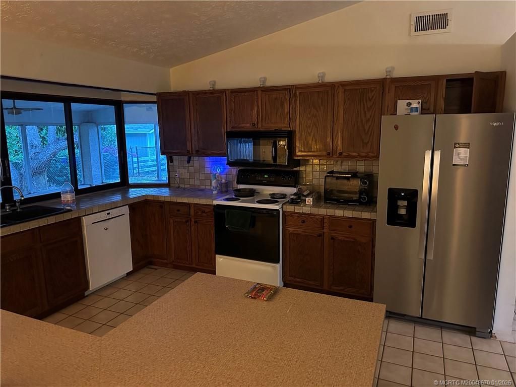 Photo of 4873 SE Pilot Way, Stuart, FL 34997 (MLS # M20048670)