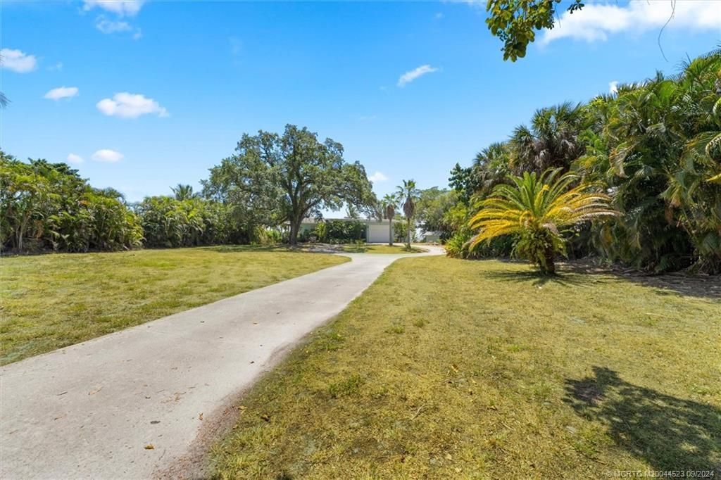 Photo of 850 NE Ixora Drive, Jensen Beach, FL 34957 (MLS # M20044523)
