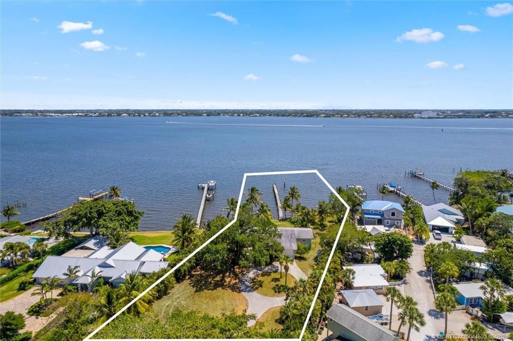 Photo of 850 NE Ixora Drive, Jensen Beach, FL 34957 (MLS # M20044523)