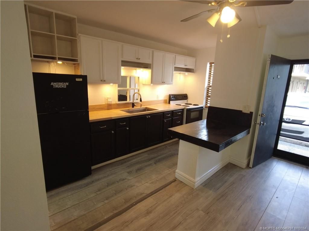 Photo of 1041 SE Monterey Road #2-11, Stuart, FL 34994 (MLS # M20045797)