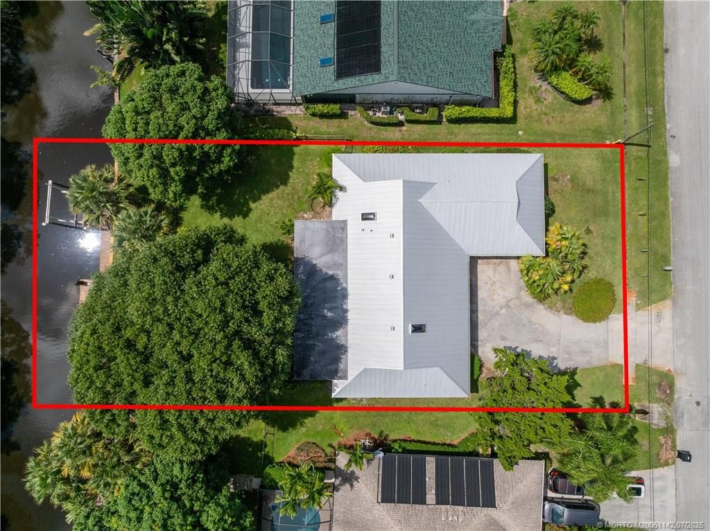 Photo of 1339 SE Coral Reef Street, Port Saint Lucie, FL 34983 (MLS # M20051142)