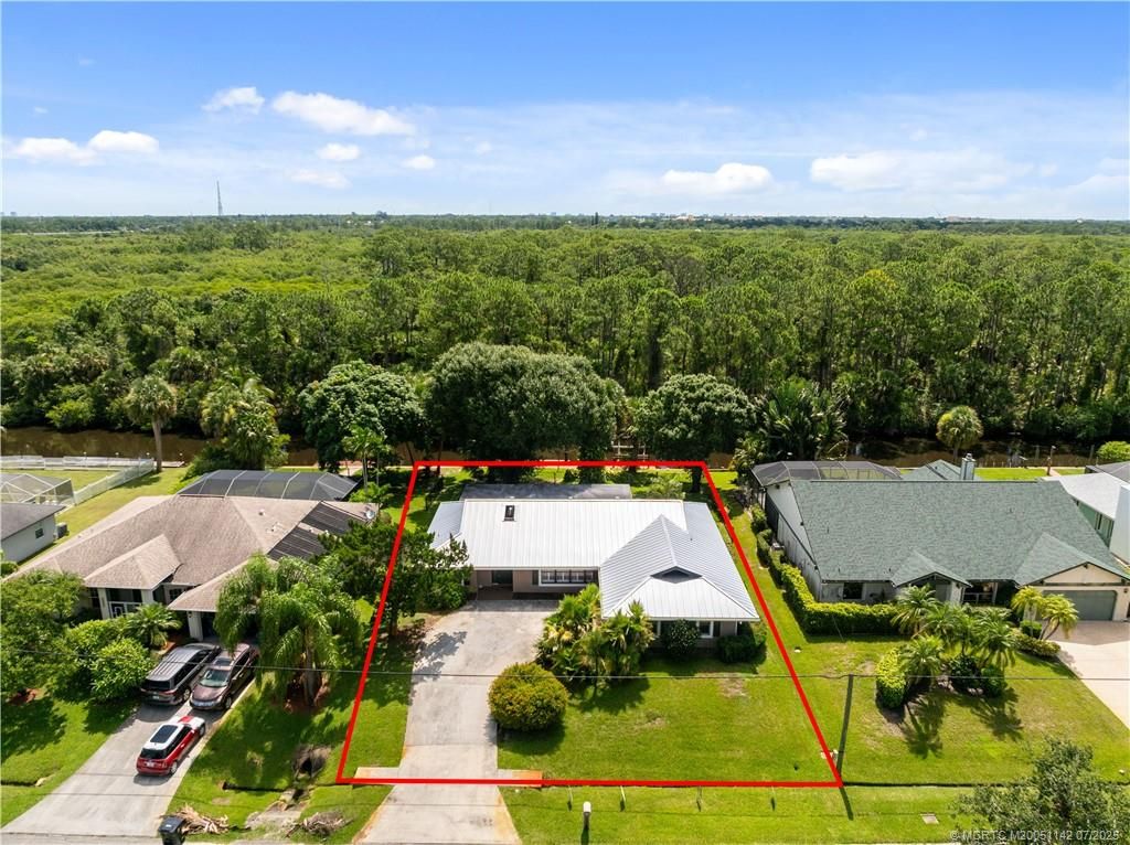 Photo of 1339 SE Coral Reef Street, Port Saint Lucie, FL 34983 (MLS # M20051142)