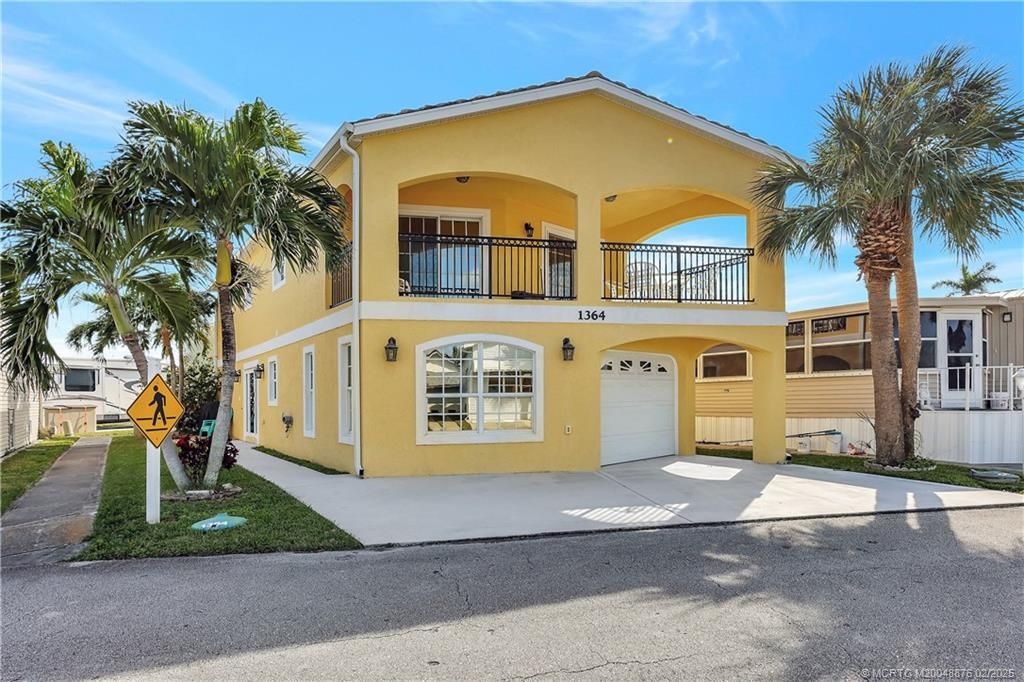 Photo of 1364 Nettles Boulevard, Jensen Beach, FL 34957 (MLS # M20048876)