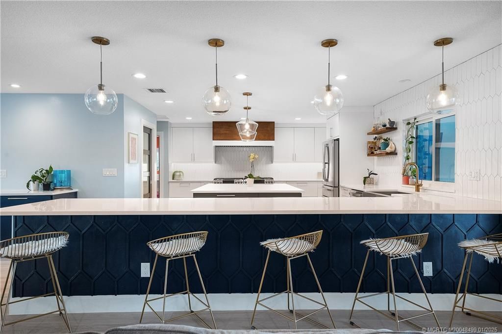 Photo of 804 NW Spruce Ridge Drive, Stuart, FL 34994 (MLS # M20048499)