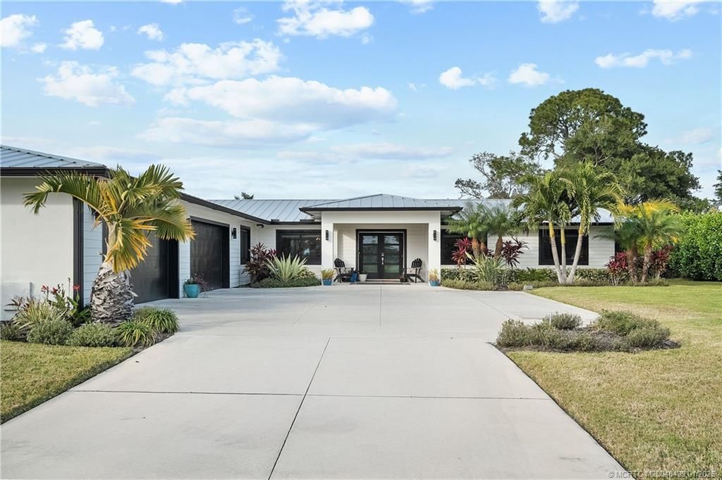 Photo of 804 NW Spruce Ridge Drive, Stuart, FL 34994 (MLS # M20048499)