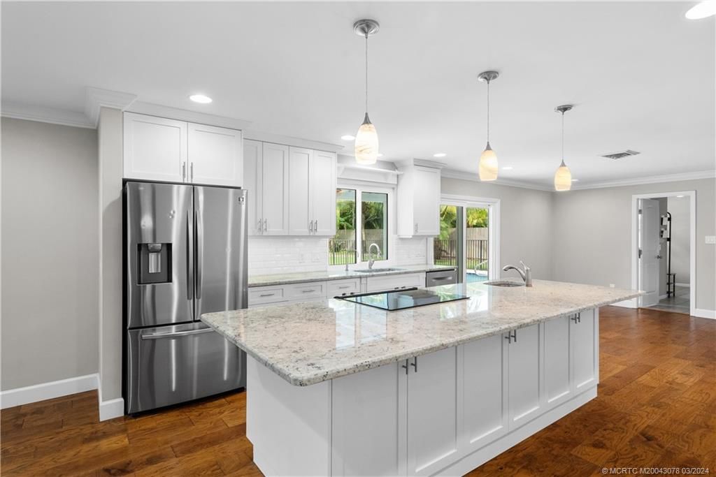 Photo of 1384 NW Spruce Ridge Drive, Stuart, FL 34994 (MLS # M20043078)