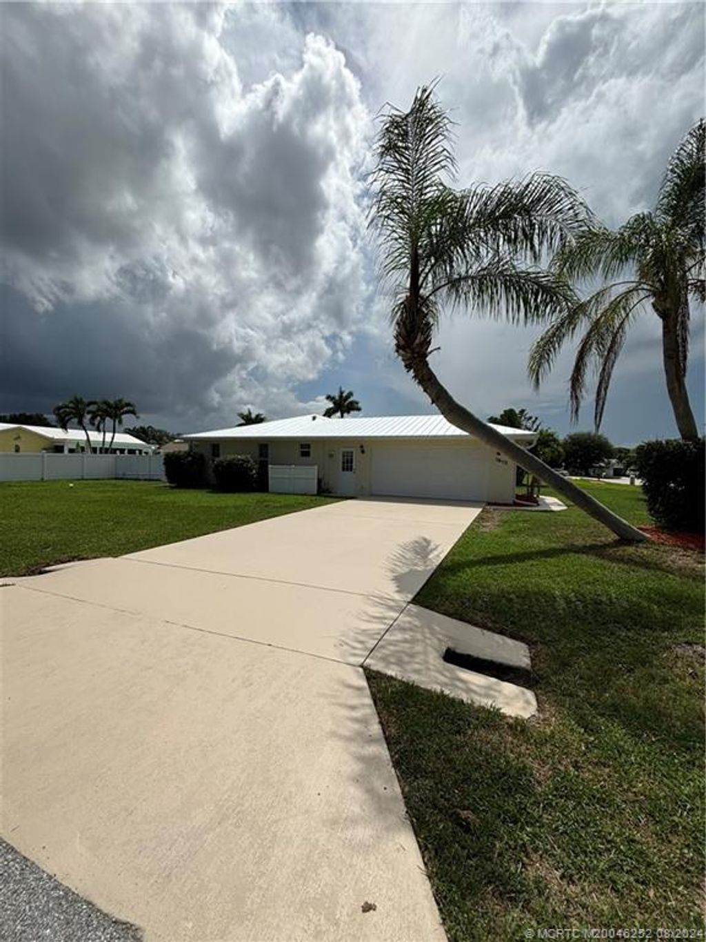 Photo of 1812 NE Acapulco Drive, Jensen Beach, FL 34957 (MLS # M20046252)