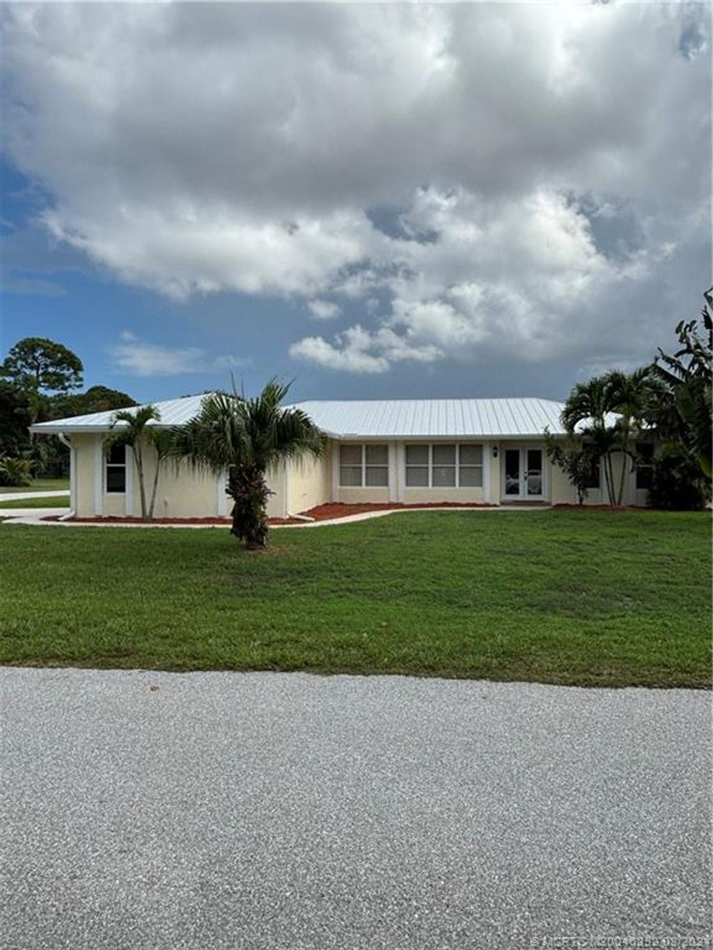 Photo of 1812 NE Acapulco Drive, Jensen Beach, FL 34957 (MLS # M20046252)