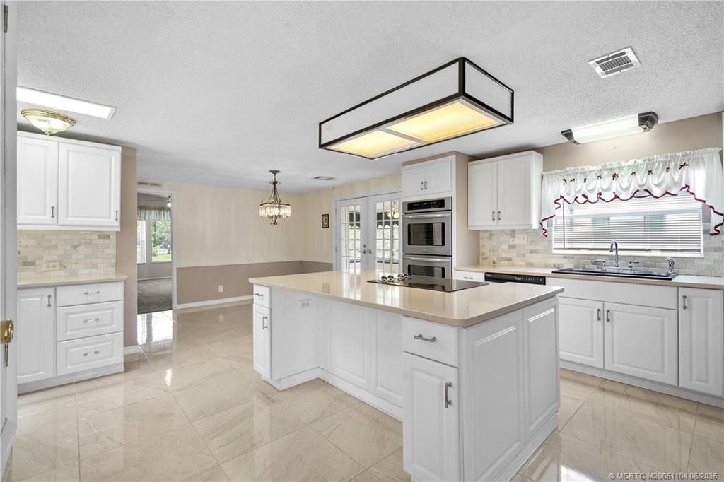 Photo of 2857 SW Toronado Trail, Stuart, FL 34997 (MLS # M20051104)