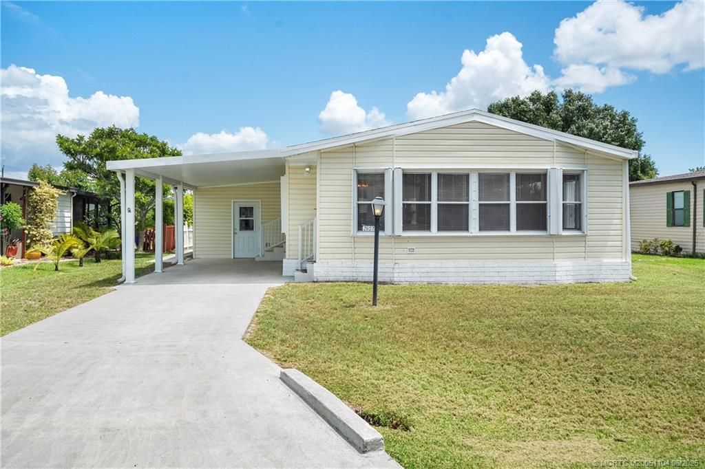 Photo of 2857 SW Toronado Trail, Stuart, FL 34997 (MLS # M20051104)