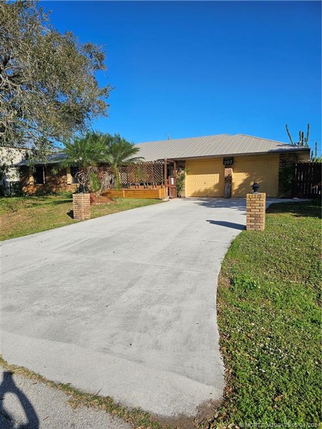 Photo of 107 NW Friar Street, Port Saint Lucie, FL 34983 (MLS # M20042915)