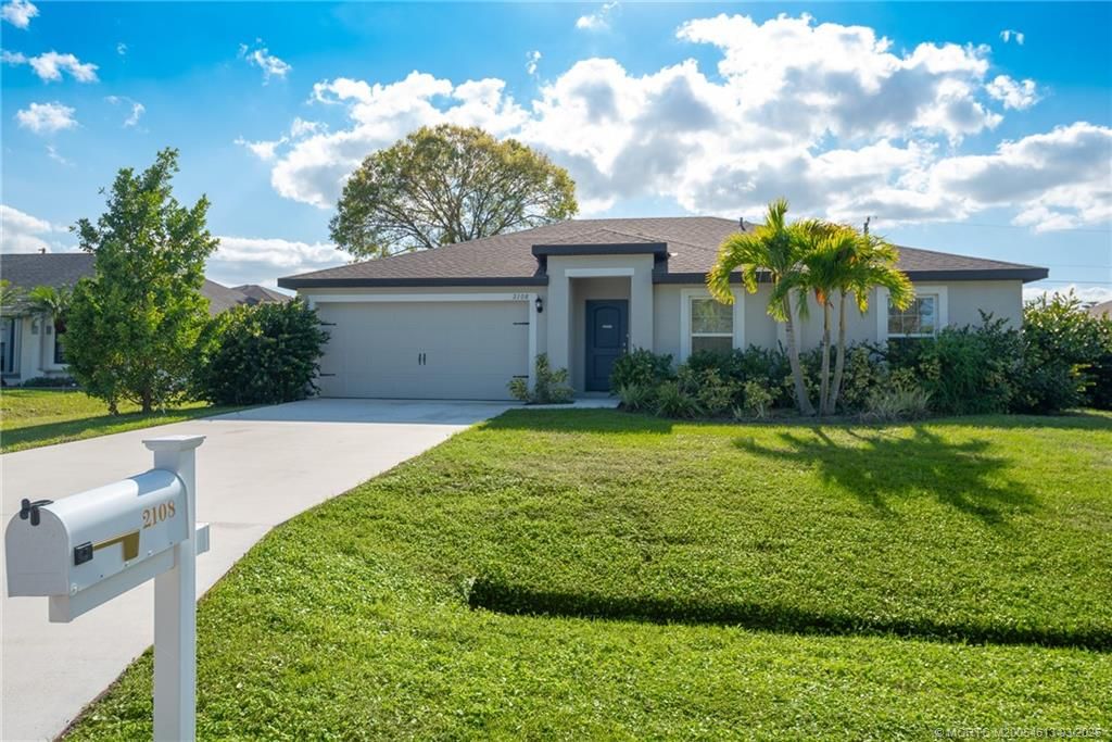 Photo of 2108 SW Vista Road, Port Saint Lucie, FL 34953 (MLS # M20054613)