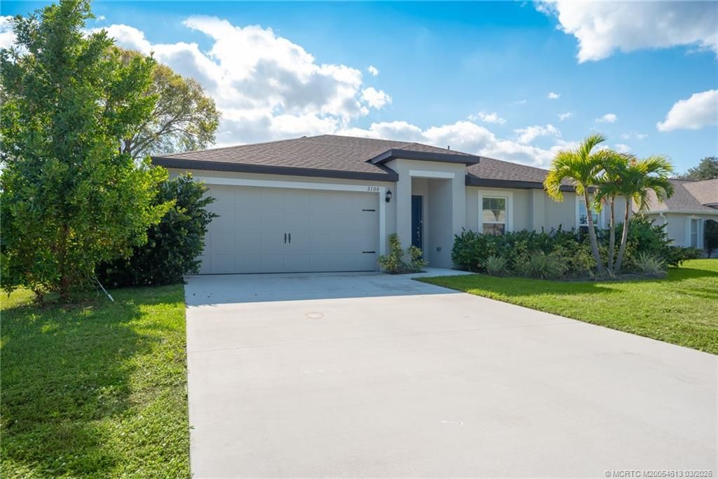 Photo of 2108 SW Vista Road, Port Saint Lucie, FL 34953 (MLS # M20054613)