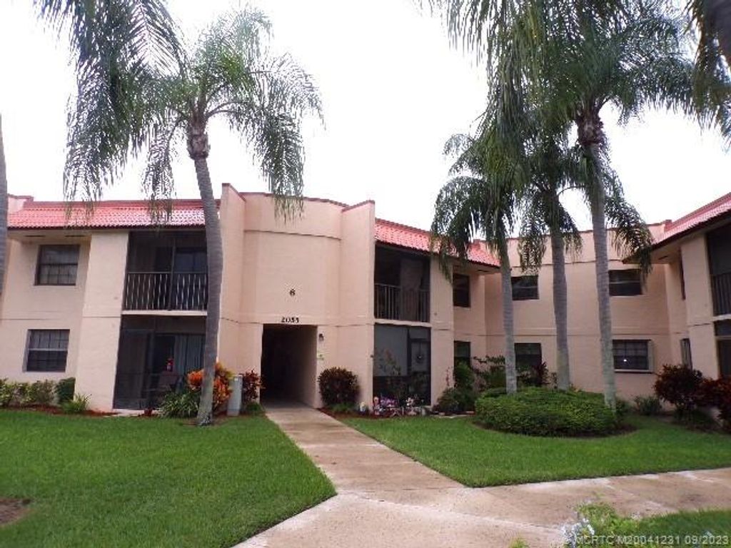 Photo of 2055 NE Collins Circle #70, Jensen Beach, FL 34957 (MLS # M20041231)