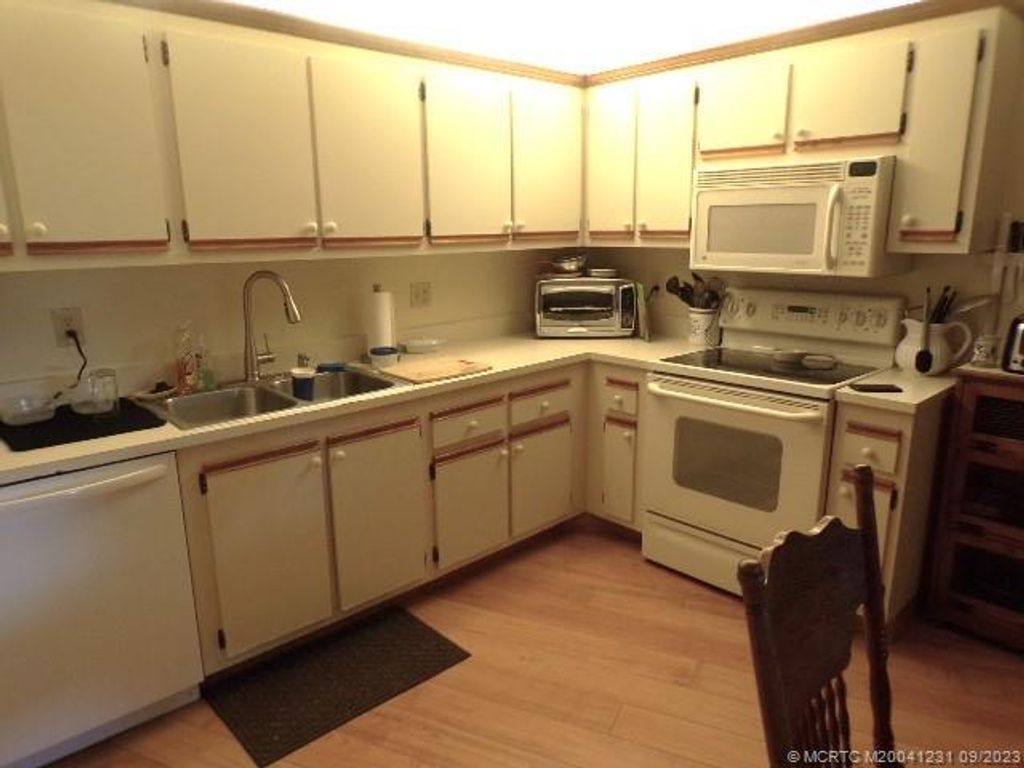 Photo of 2055 NE Collins Circle #70, Jensen Beach, FL 34957 (MLS # M20041231)