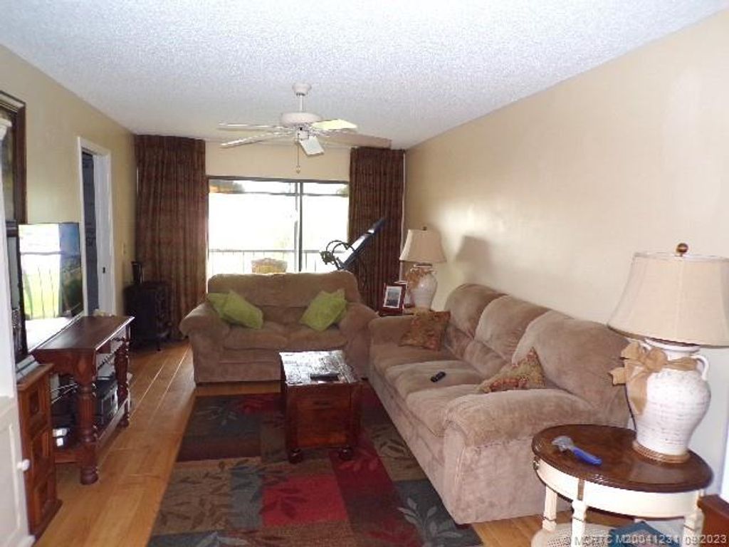 Photo of 2055 NE Collins Circle #70, Jensen Beach, FL 34957 (MLS # M20041231)