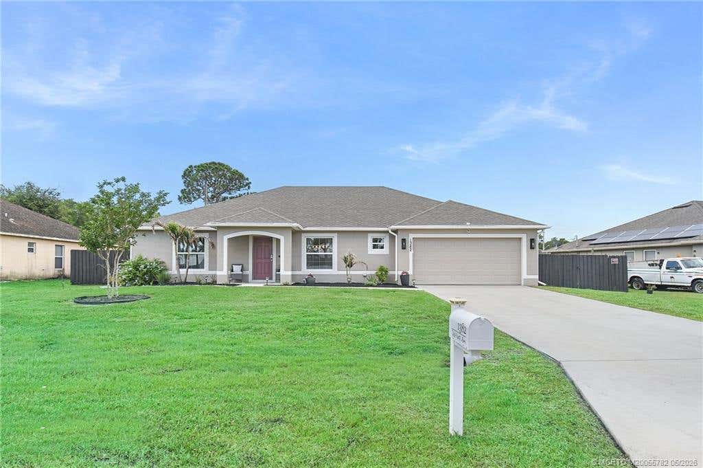 Photo of 1382 SW Crest Avenue, Port Saint Lucie, FL 34953 (MLS # M20055782)