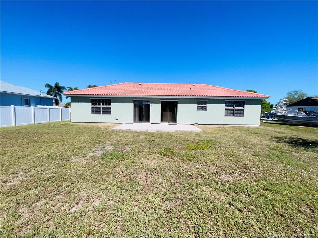 Photo of 590 NW Kilpatrick Avenue, Port Saint Lucie, FL 34983 (MLS # M20049626)