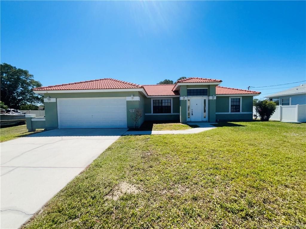 Photo of 590 NW Kilpatrick Avenue, Port Saint Lucie, FL 34983 (MLS # M20049626)