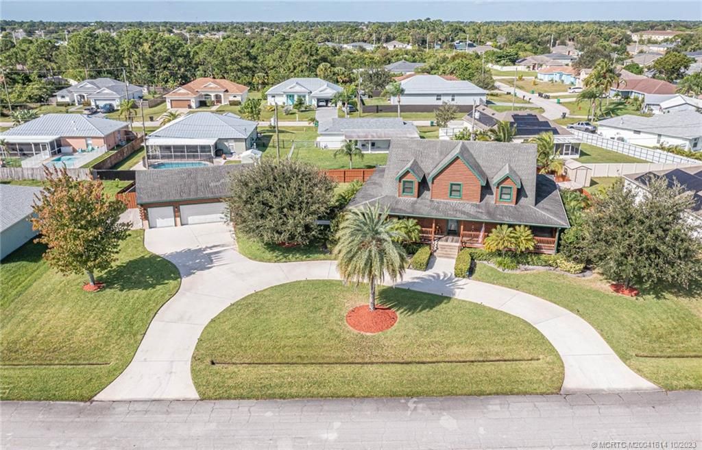 Photo of 4550 SW Calloway Street, Port Saint Lucie, FL 34953 (MLS # M20041614)