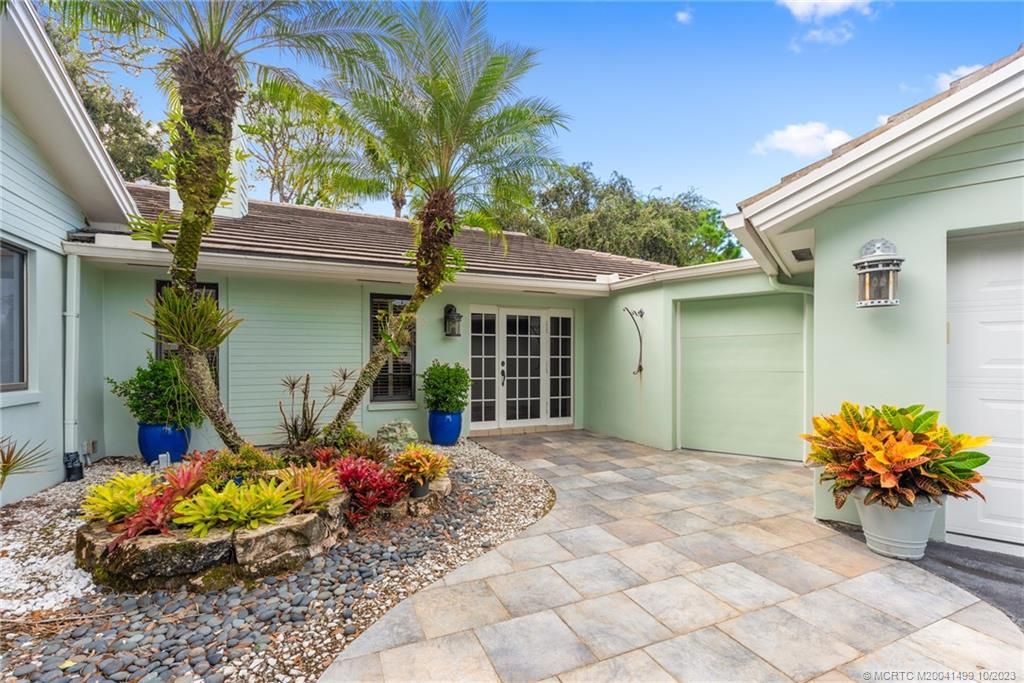 Photo of 2103 NW Greenbriar Lane, Palm City, FL 34990 (MLS # M20041499)