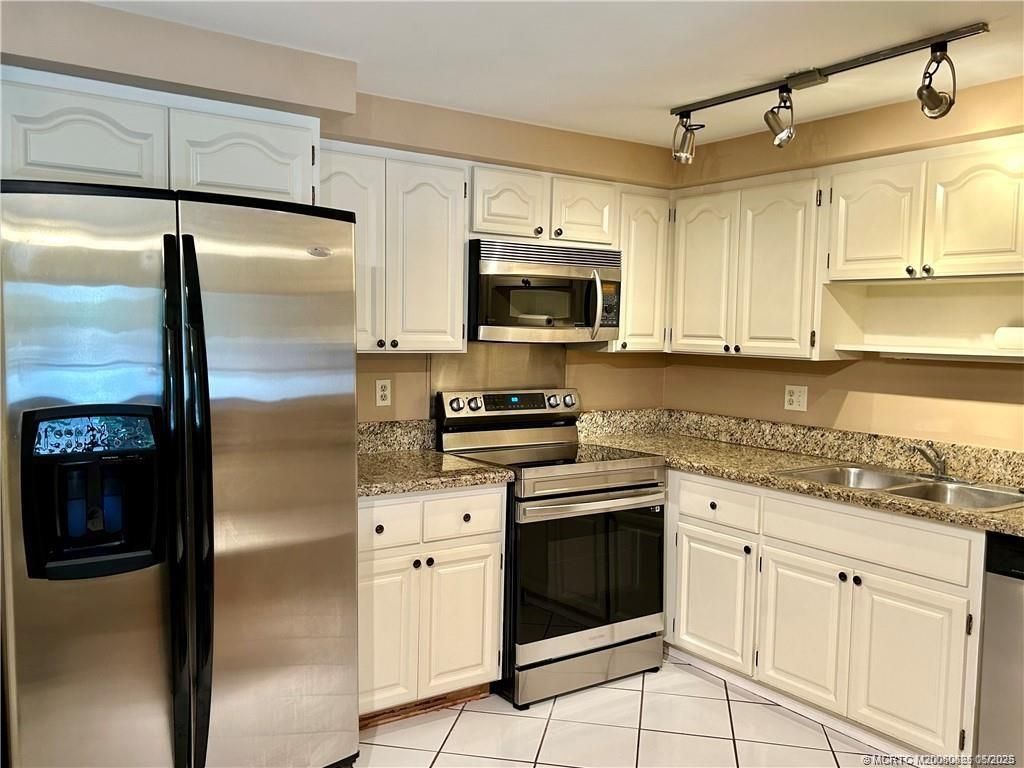 Photo of 200 SE Four Winds Drive #210, Stuart, FL 34996 (MLS # M20050625)