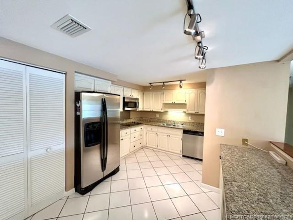 Photo of 200 SE Four Winds Drive #210, Stuart, FL 34996 (MLS # M20050625)