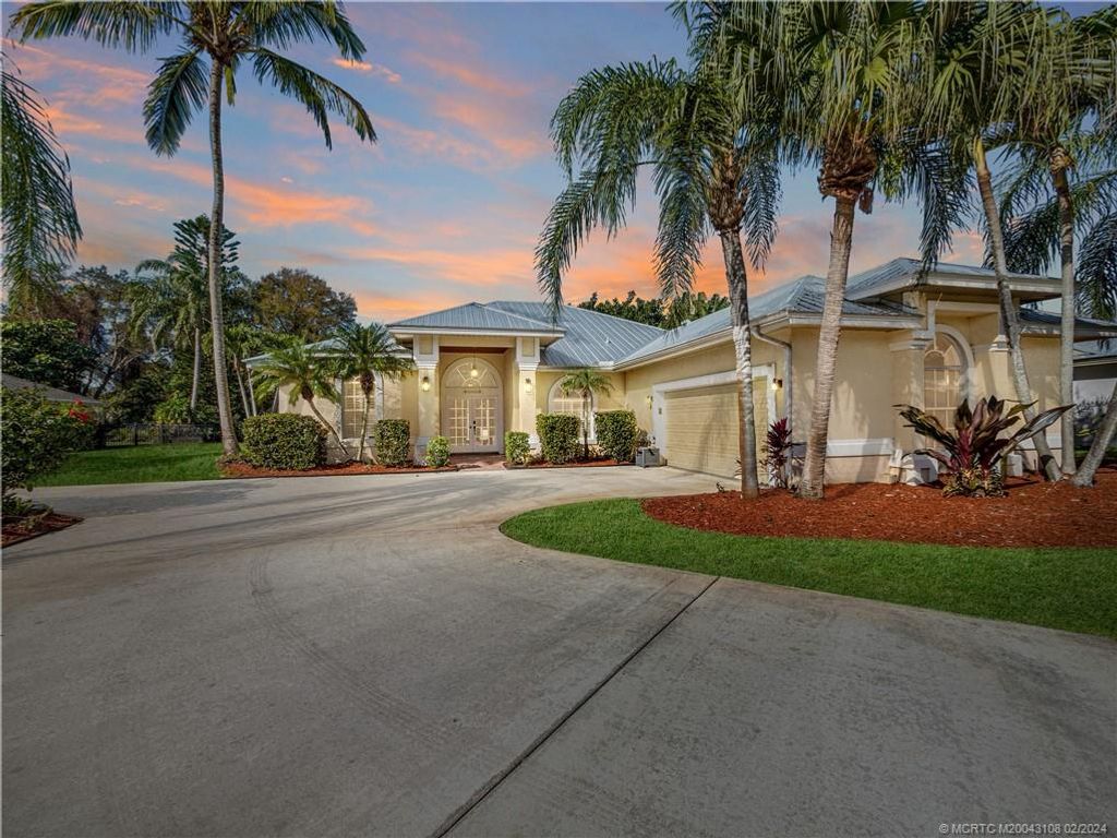 Photo of 2108 SW Hunters Club Way, Palm City, FL 34990 (MLS # M20043108)