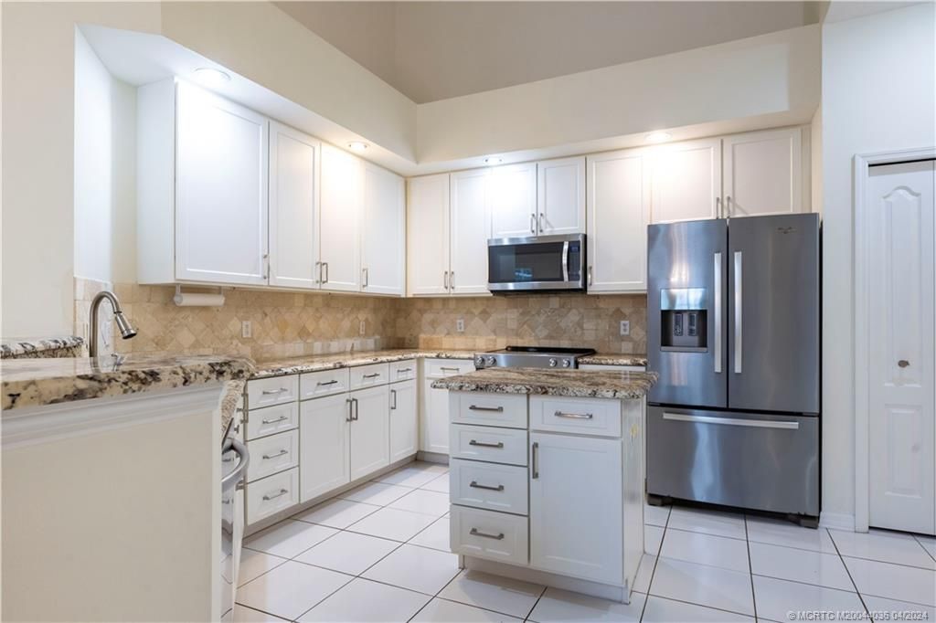 Photo of 1676 SW Harbour Isles Circle #97, Port Saint Lucie, FL 34986 (MLS # M20044036)