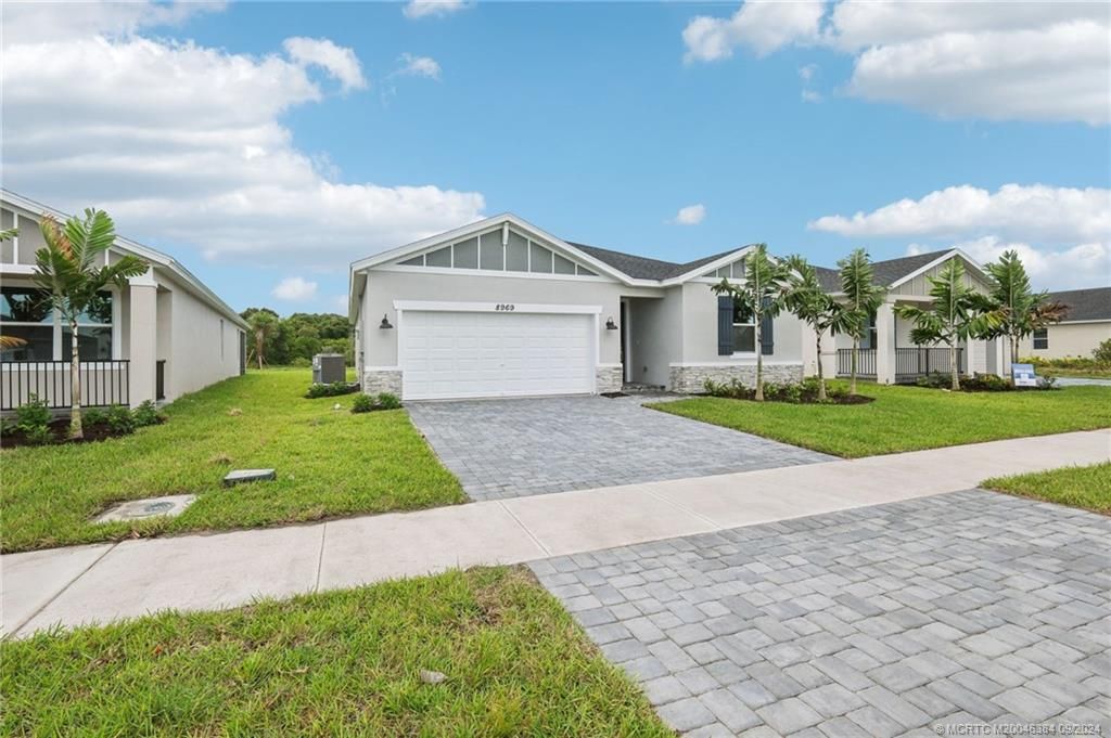 Photo of 8969 Dahlia Circle, Port Saint Lucie, FL 34986 (MLS # M20046384)