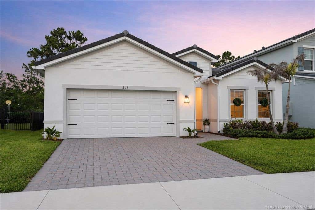 Photo of 208 SW Pomeroy Street, Stuart, FL 34997 (MLS # M20056077)
