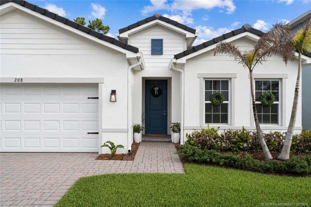 Photo of 208 SW Pomeroy Street, Stuart, FL 34997 (MLS # M20056077)