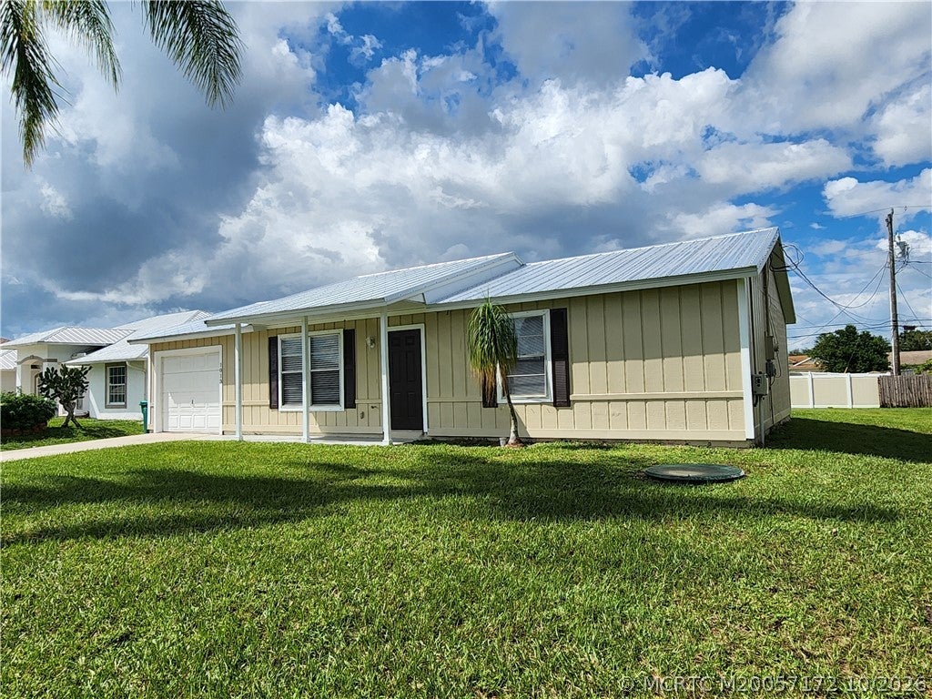 Photo of 1013 SW California Boulevard, Port Saint Lucie, FL 34953 (MLS # M20057172)