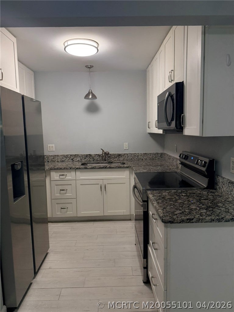 Photo of 2124 SE Edler Drive, Stuart, FL 34994 (MLS # M20055101)