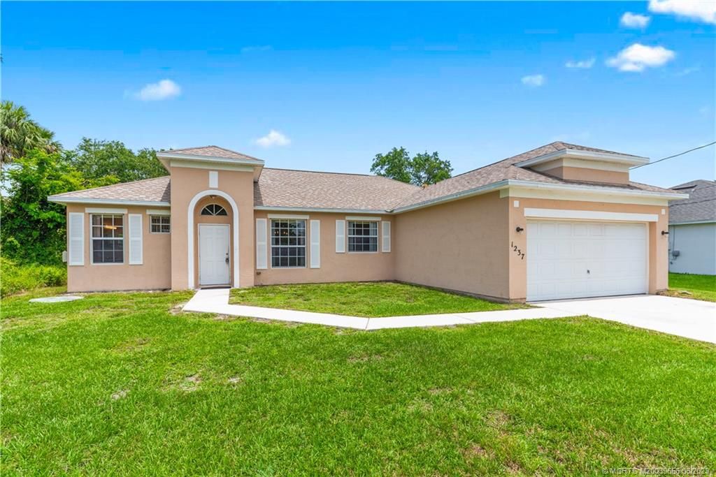 Photo of 1237 SW Babcock Avenue, Port Saint Lucie, FL 34953 (MLS # M20039656)