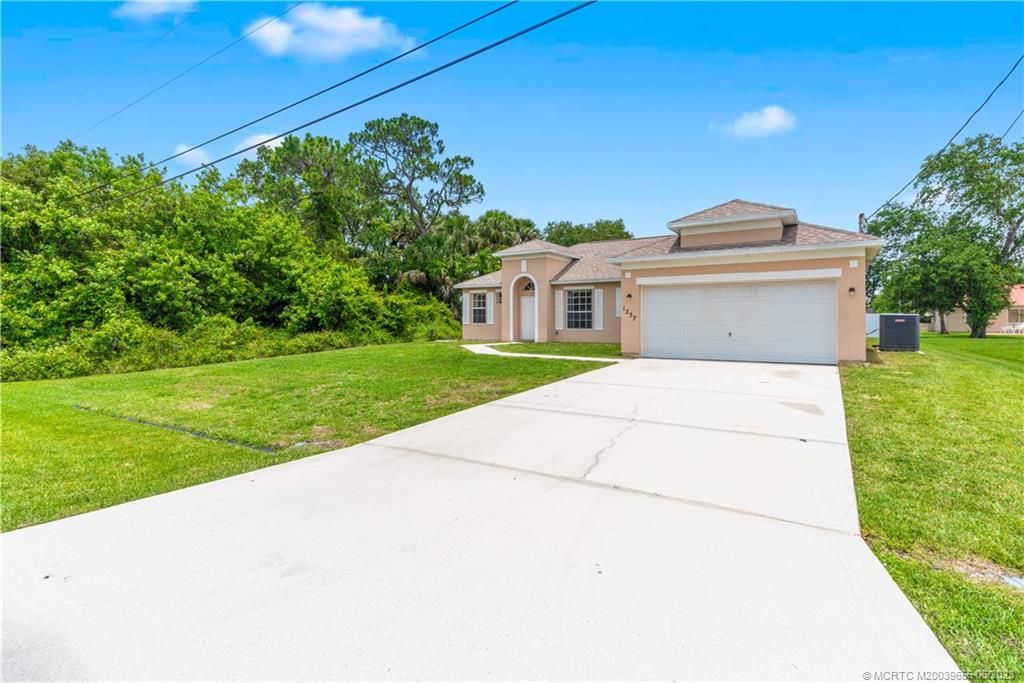 Photo of 1237 SW Babcock Avenue, Port Saint Lucie, FL 34953 (MLS # M20039656)