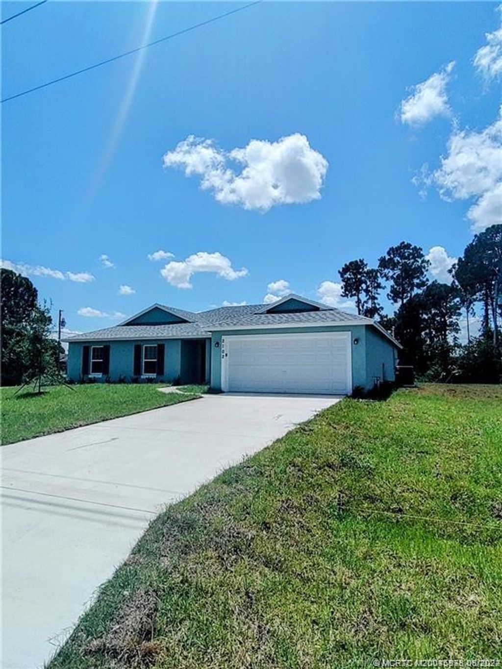 Photo of 2101 SW Devon Avenue, Port Saint Lucie, FL 34953 (MLS # M20045578)