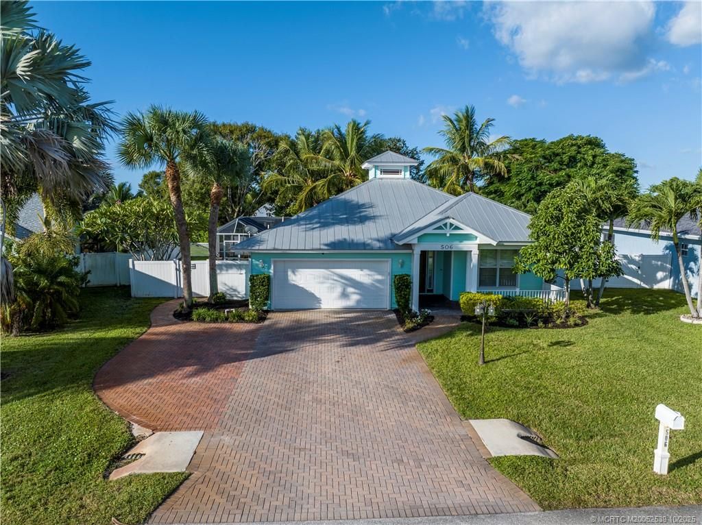 Photo of 506 NE Pecos Way, Jensen Beach, FL 34957 (MLS # M20052539)