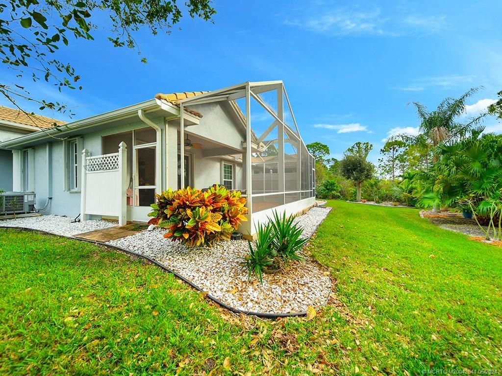 Photo of 570 NW Red Pine Way, Jensen Beach, FL 34957 (MLS # M20042641)