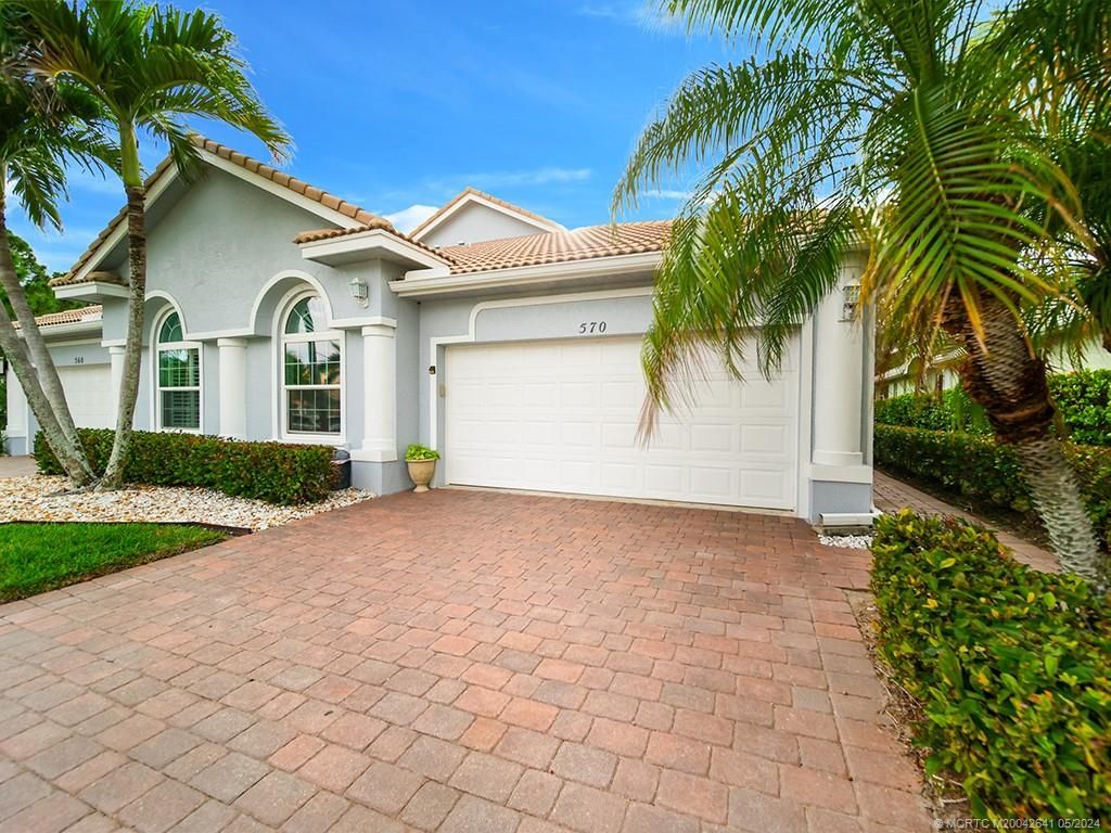 Photo of 570 NW Red Pine Way, Jensen Beach, FL 34957 (MLS # M20042641)
