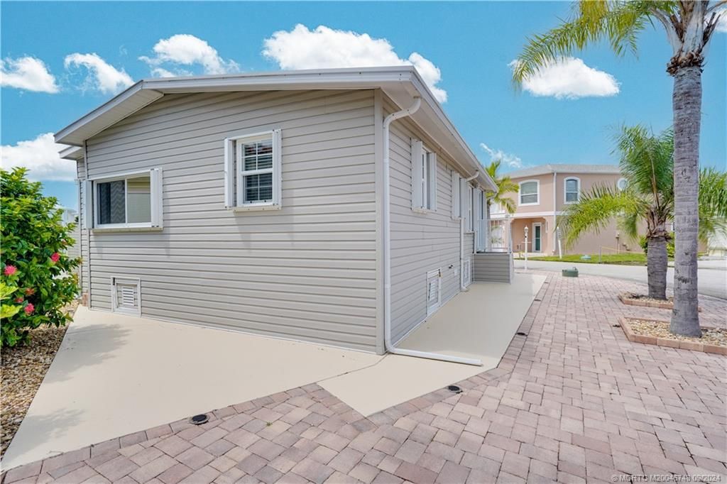 Photo of 755 Nettles Boulevard, Jensen Beach, FL 34957 (MLS # M20046748)